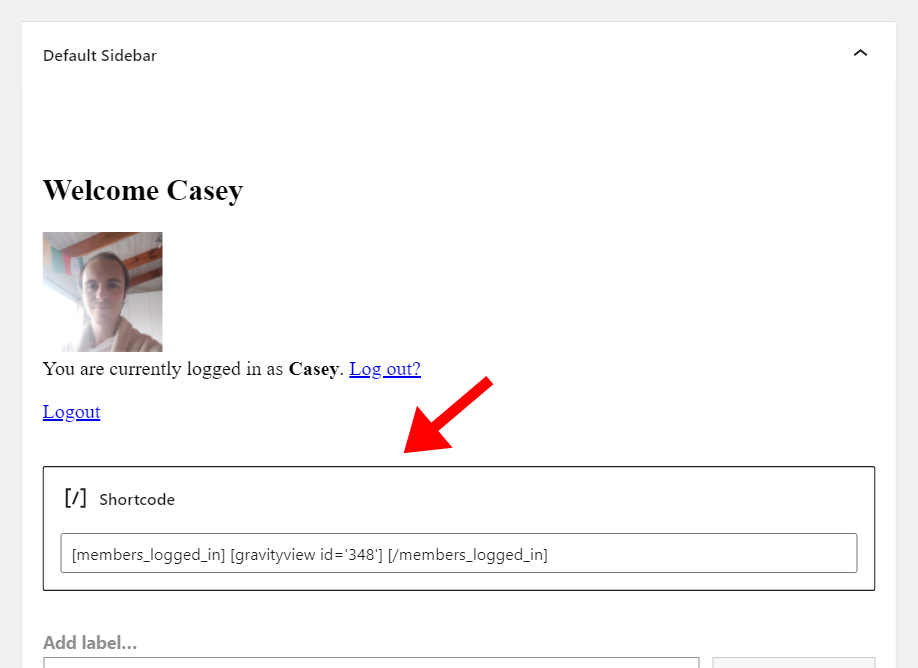 Welcome message with a profile image, logout link, and shortcode box for user profile editing